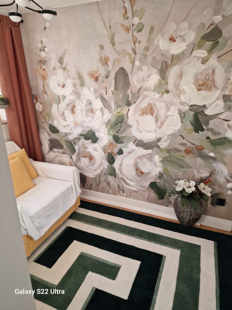 Living Room & Bedroom Renovation | London & Home Counties 24 A floral mural featuring large white roses and green foliage on a wall in a room. - London