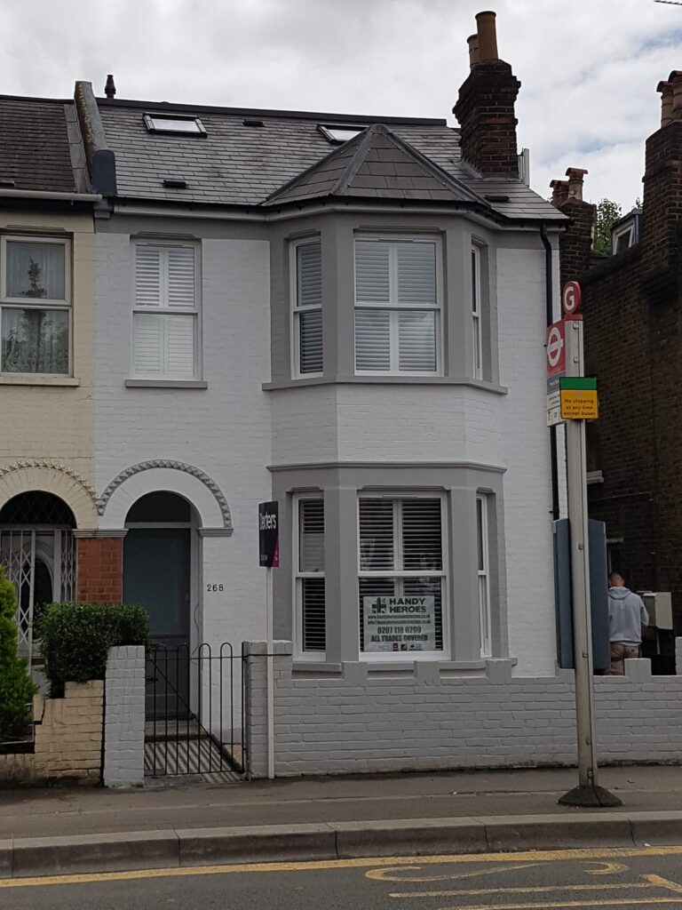 Garden Buildings & Outdoor Spaces | London & Home Counties 5 Two-storey residential property featuring a bay window and white exterior paint. - London