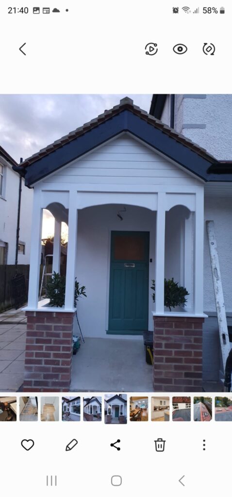 Garden Buildings & Outdoor Spaces | London & Home Counties 12 Front porch featuring a blue door, white wooden structure, and brick columns on either side. - London