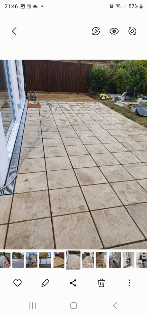 Garden Buildings & Outdoor Spaces | London & Home Counties 15 Paved patio area with rectangular tiles and a drainage channel along the edge. - London