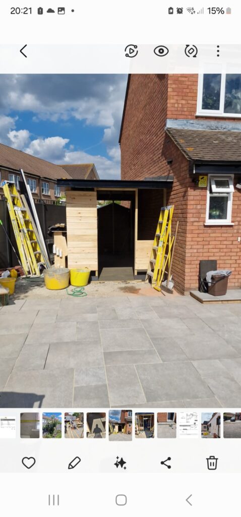 Garden Buildings & Outdoor Spaces | London & Home Counties 29 A partially constructed wooden structure with scaffolding and tools in a residential area.